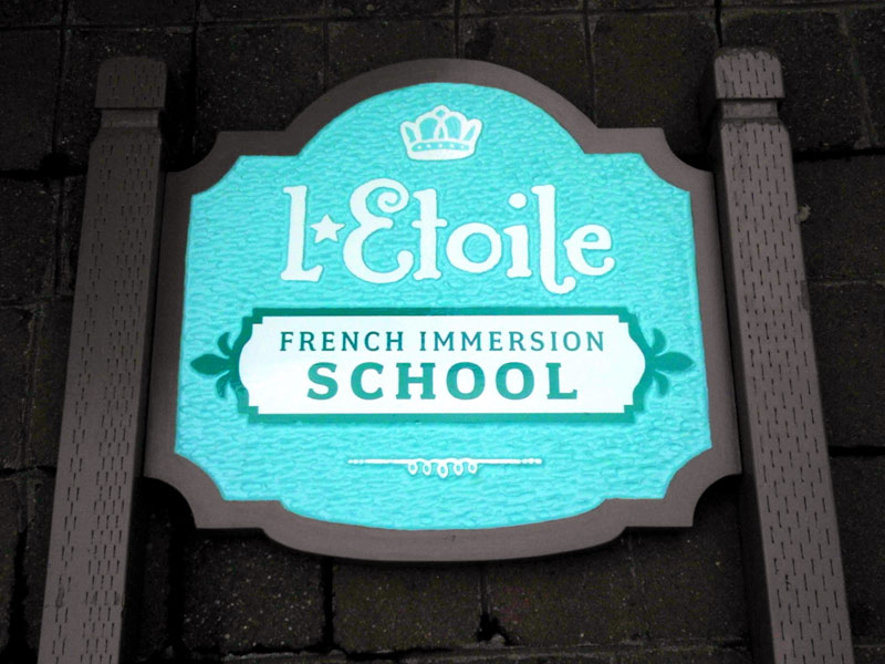 Double-sided carved monument sign for L-Etoile French Immersion School, SW Portland, OR
