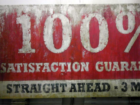 Custom aged and distressed wood sign for TV commercial