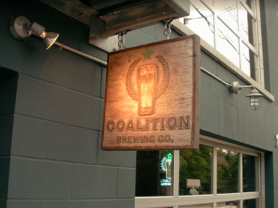 Carved double sided hanging sign for Coalition Brewing